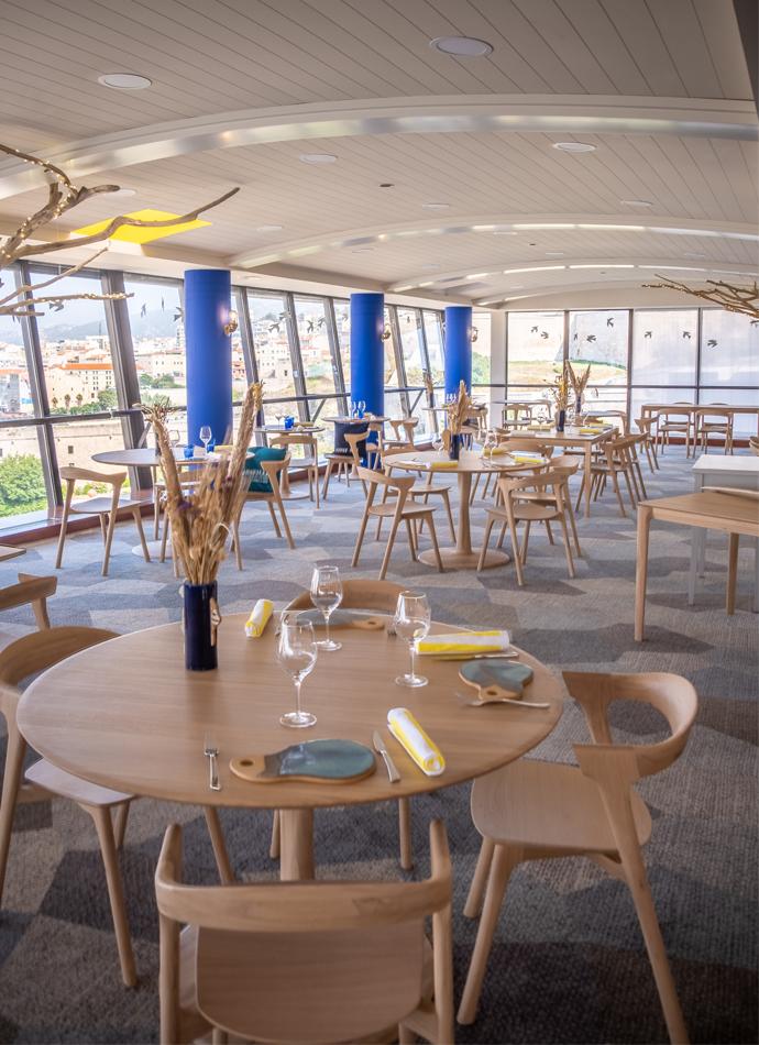 Restaurant Sofitel Oak Torsion dining tables and Oak Bok dining chairs | Live Light