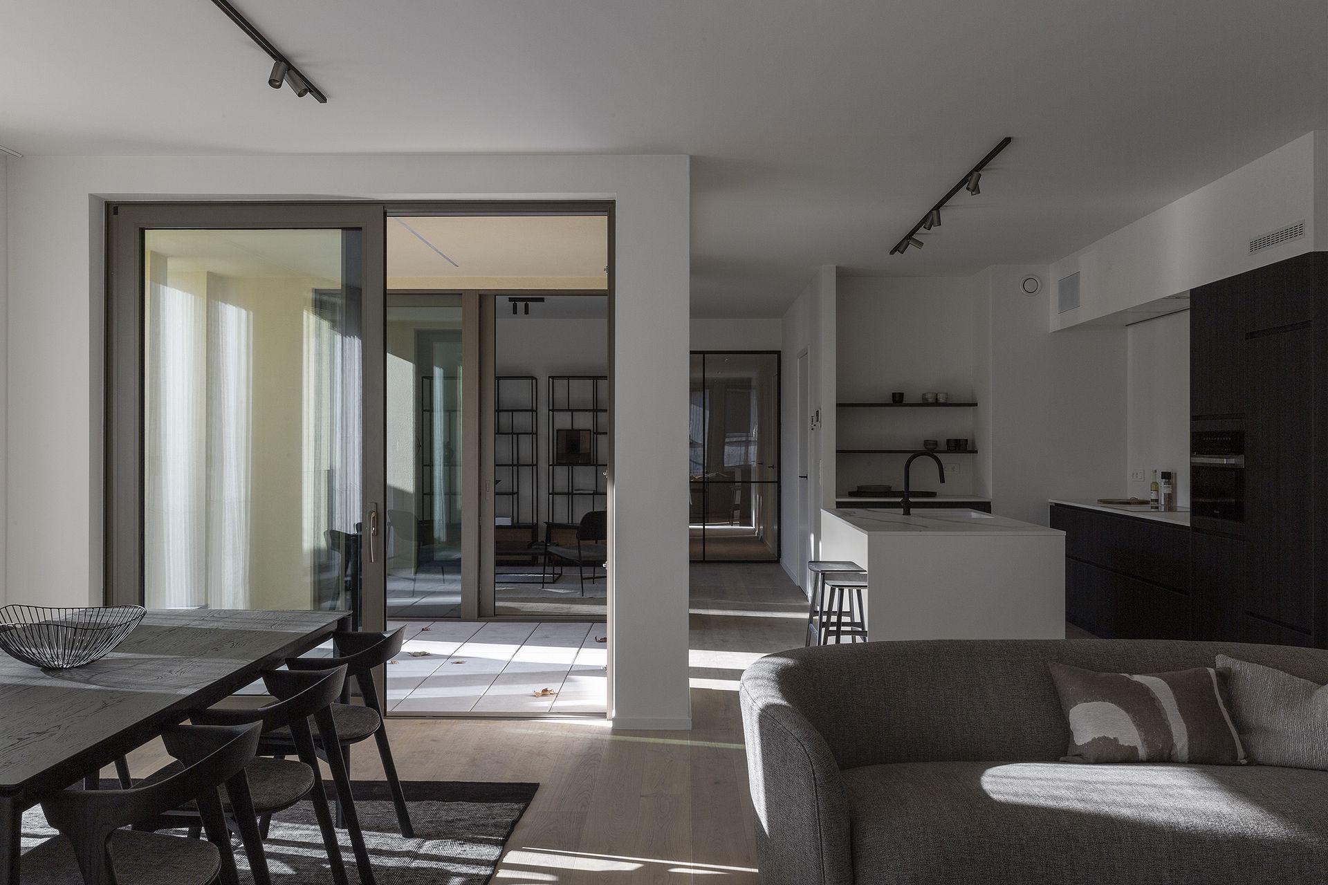 Ellipse sofa and Bok dining table in Living room | Live Light