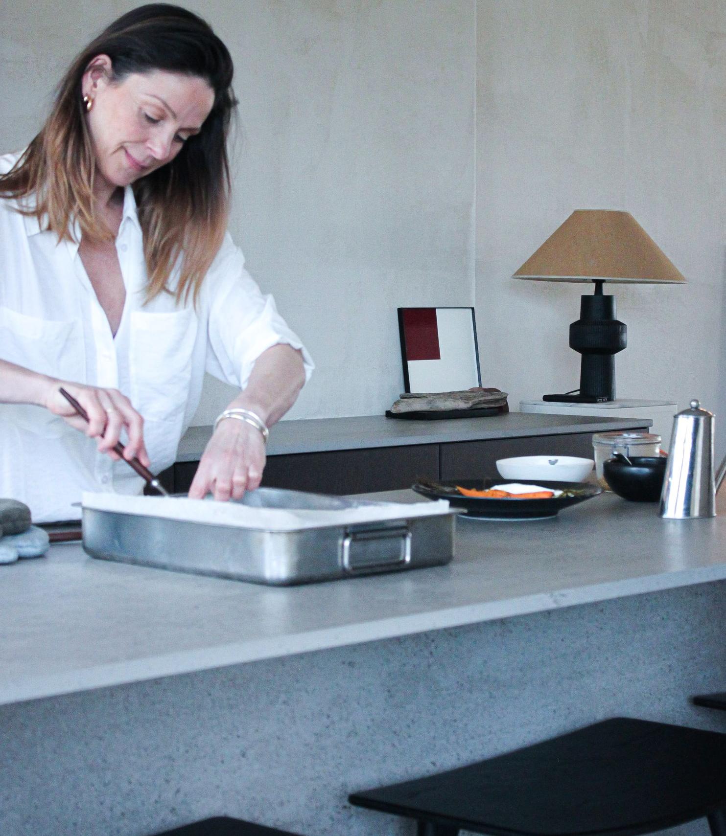 Live Light | Sofie Noyen in her kitchen creating a dish