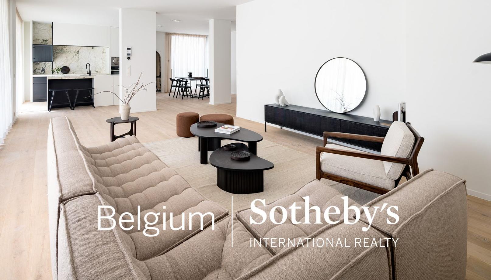 Live Light | Sotheby’s apartment styled with the N701 sofa, Barrow poufs, Mahogany Pi side table and more.