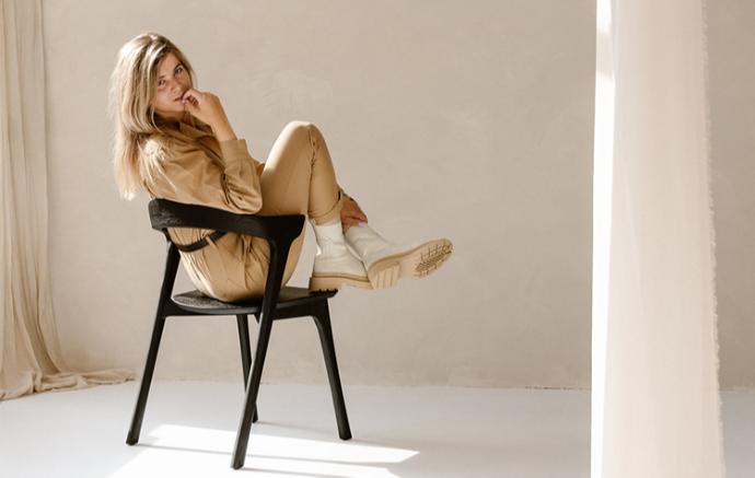 Live Light member Roos on a Bok chair | Live Light Live Light member Roos on a Bok chair | Live Light