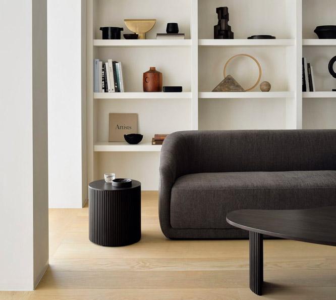 Trapeze sofa of Ethnicraft and roller max side table | Live Light Trapeze sofa of Ethnicraft and roller max side table | Live Light